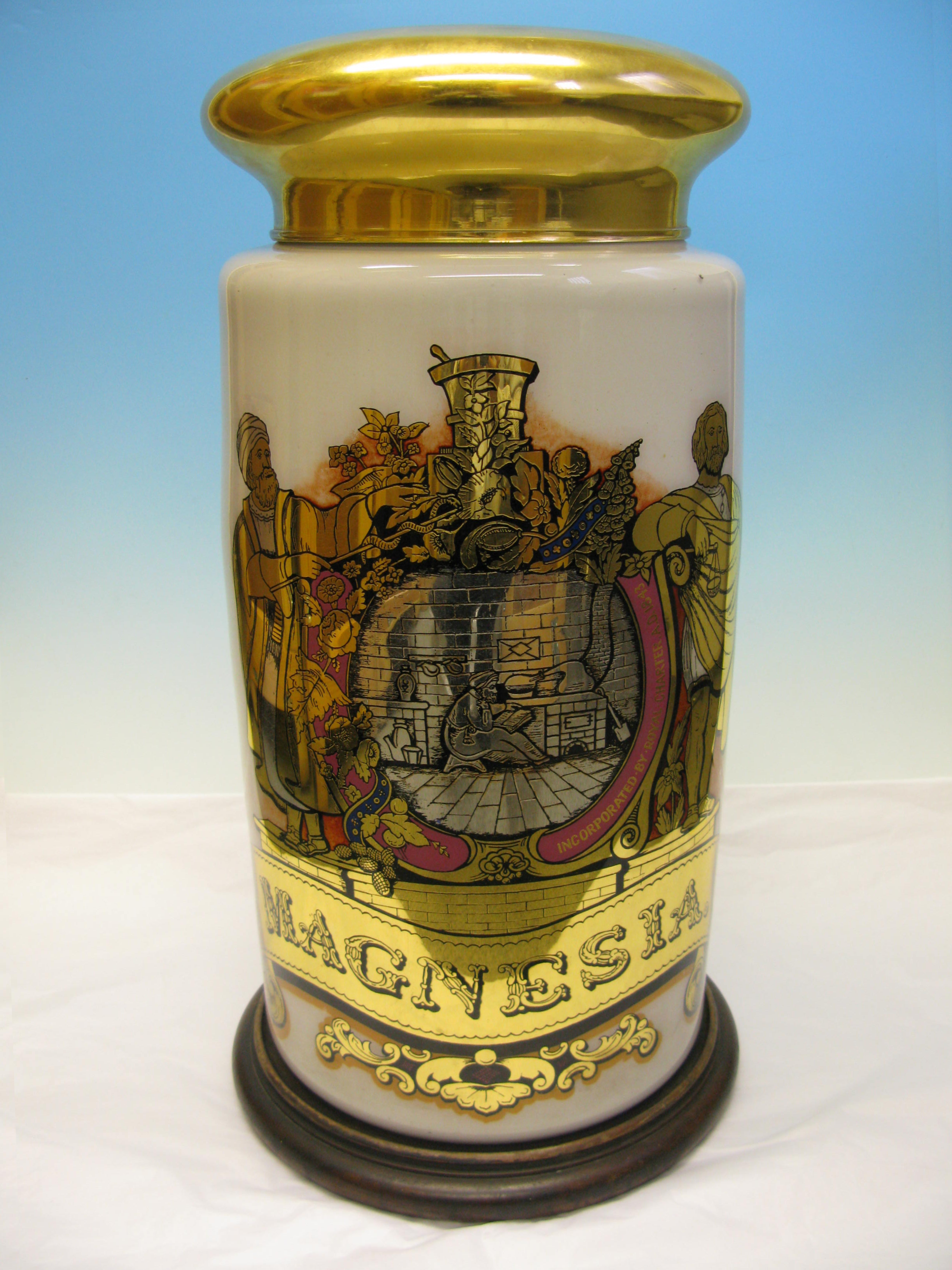 LDRPS: LSA7, 19th Century. This gold and white specie jar would have been used for decoration, rather than to store materials. The Jar is decorated with the coat of arms of the Pharmaceutical Society